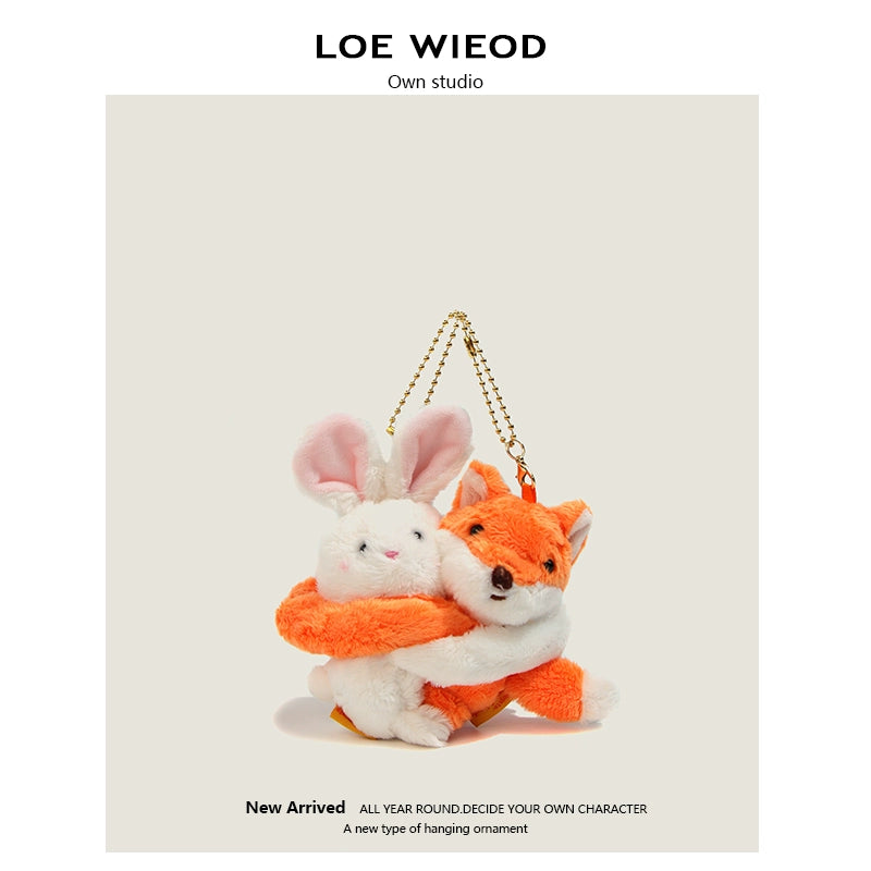 Animal Hugging Plush Keychain