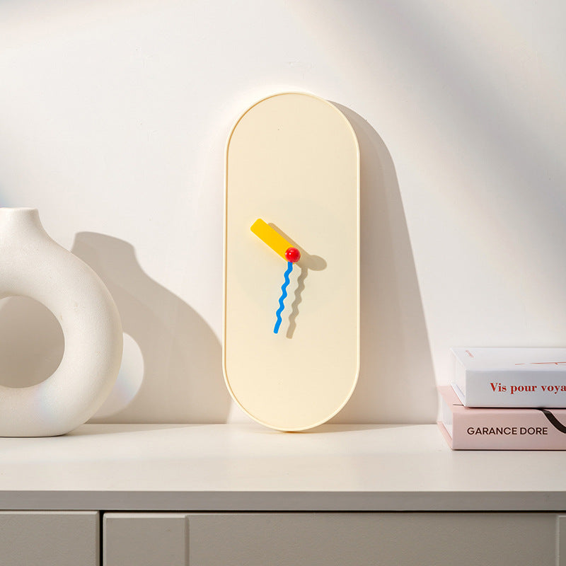 Nordic Oval Wall Clock with Wavy Hands