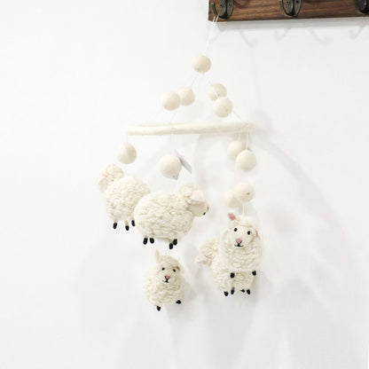 Cute handmade baby mobile with soft white lambs, eco-friendly wool nursery decoration