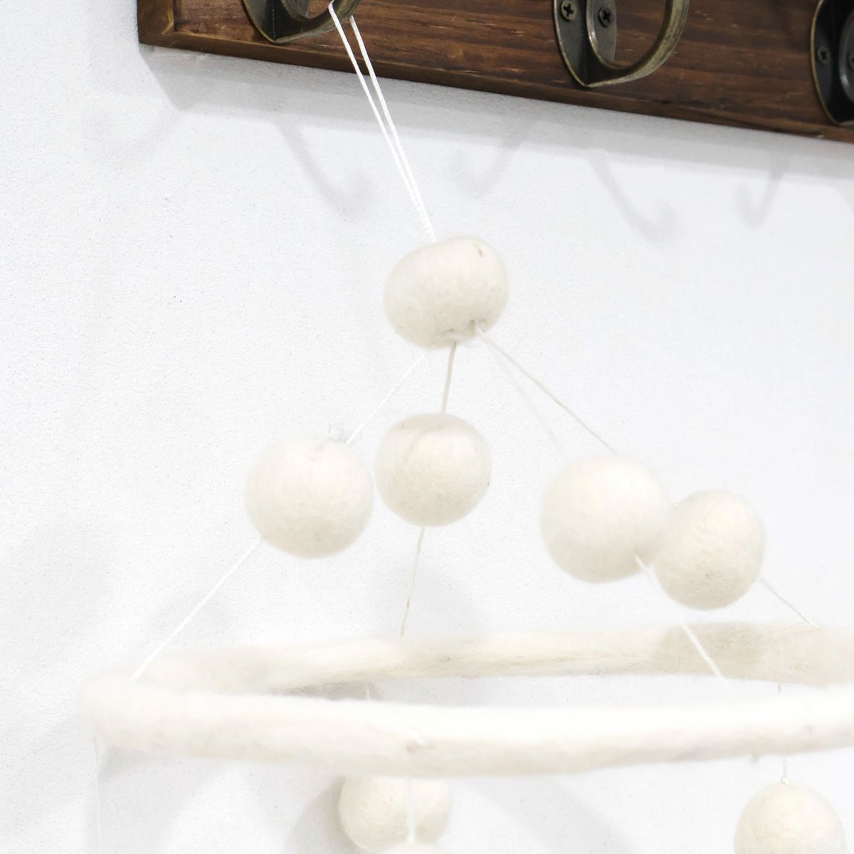 Cute handmade baby mobile with soft white lambs, eco-friendly wool nursery decoration