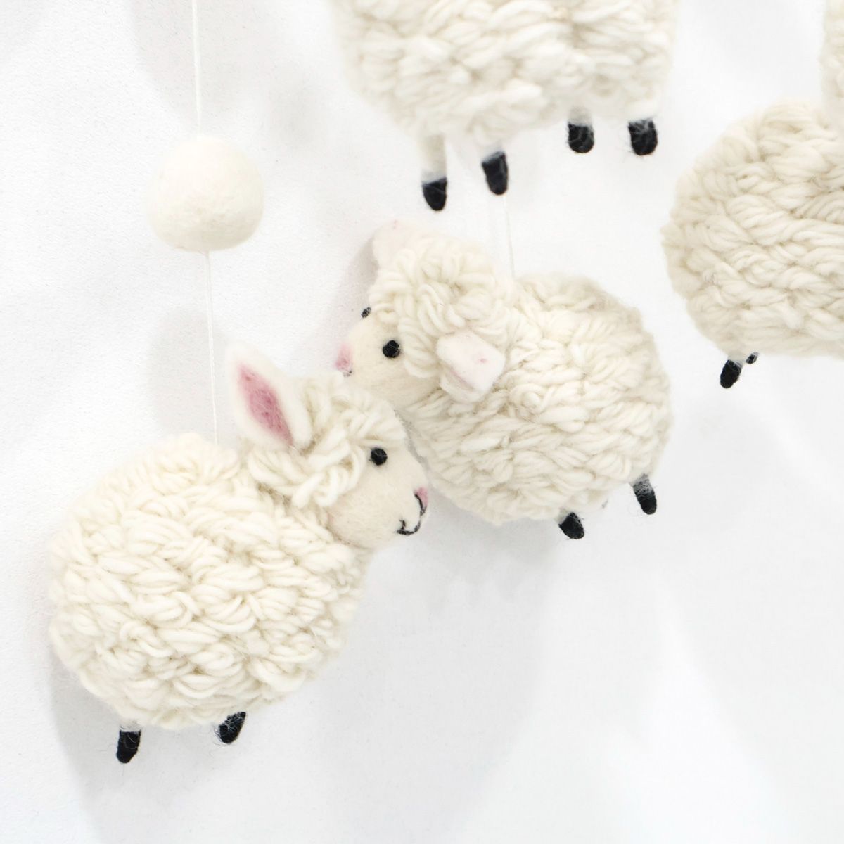 Cute handmade baby mobile with soft white lambs, eco-friendly wool nursery decoration