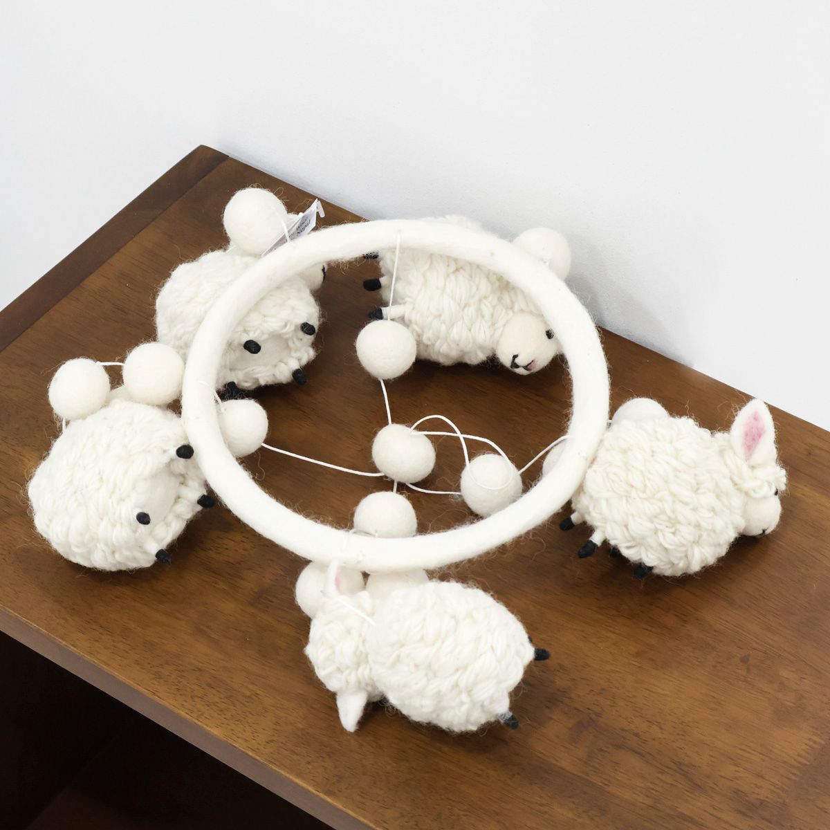 Cute handmade baby mobile with soft white lambs, eco-friendly wool nursery decoration
