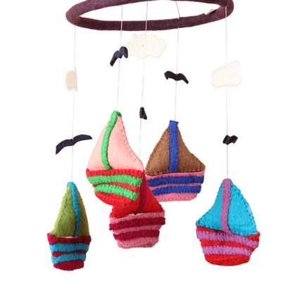 Felt sailboat baby mobile handmade with wool, eco-friendly nursery gift made in Nepal