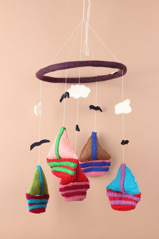 Felt sailboat baby mobile handmade with wool, eco-friendly nursery gift made in Nepal