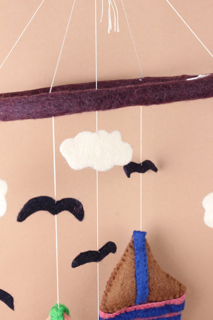 Felt sailboat baby mobile handmade with wool, eco-friendly nursery gift made in Nepal
