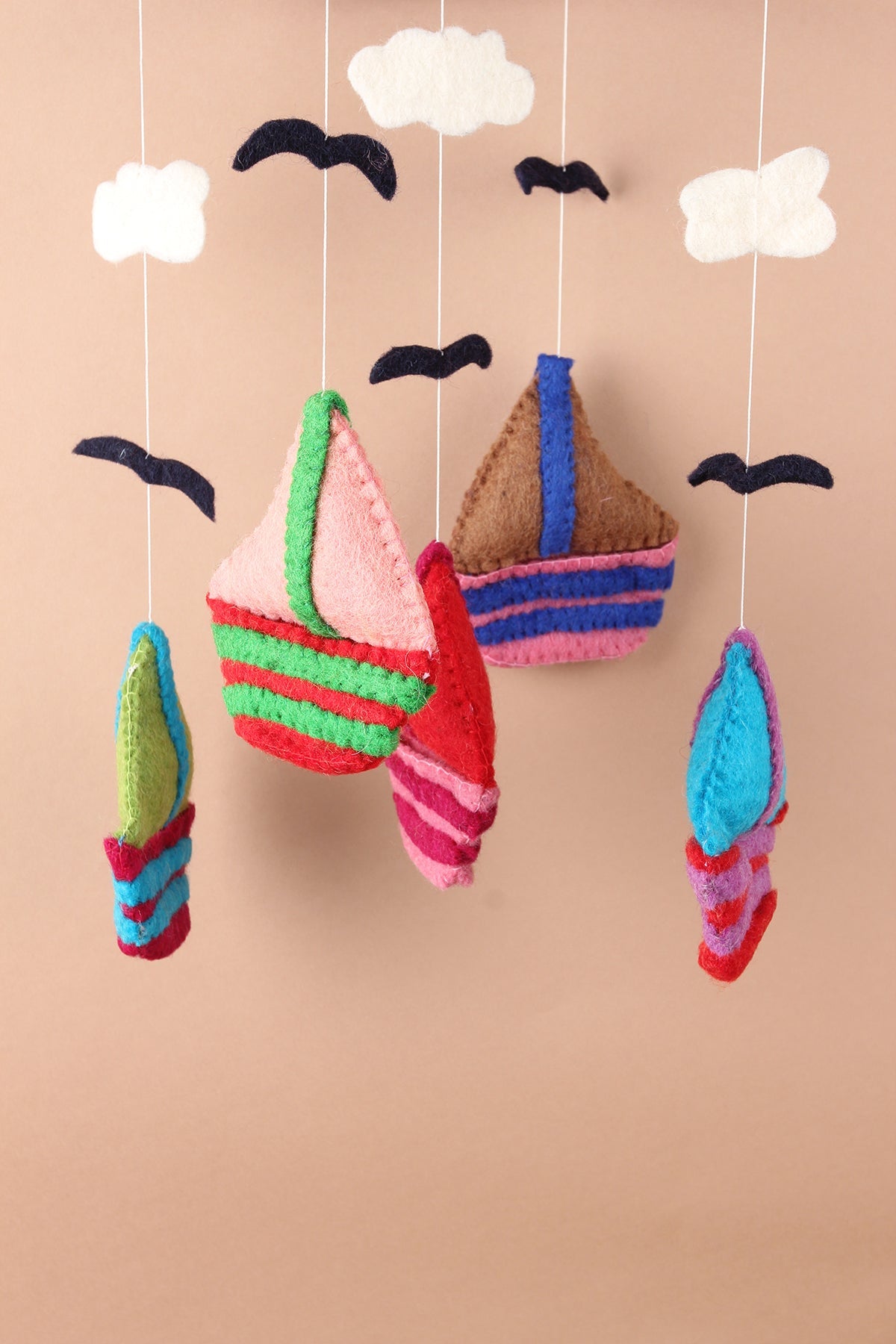 Felt sailboat baby mobile handmade with wool, eco-friendly nursery gift made in Nepal