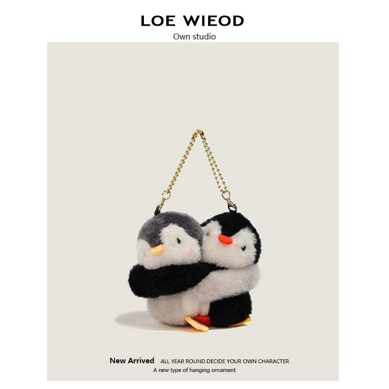 Animal Hugging Plush Keychain