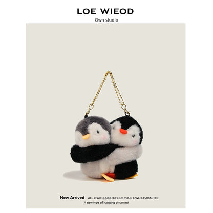 Animal Hugging Plush Keychain