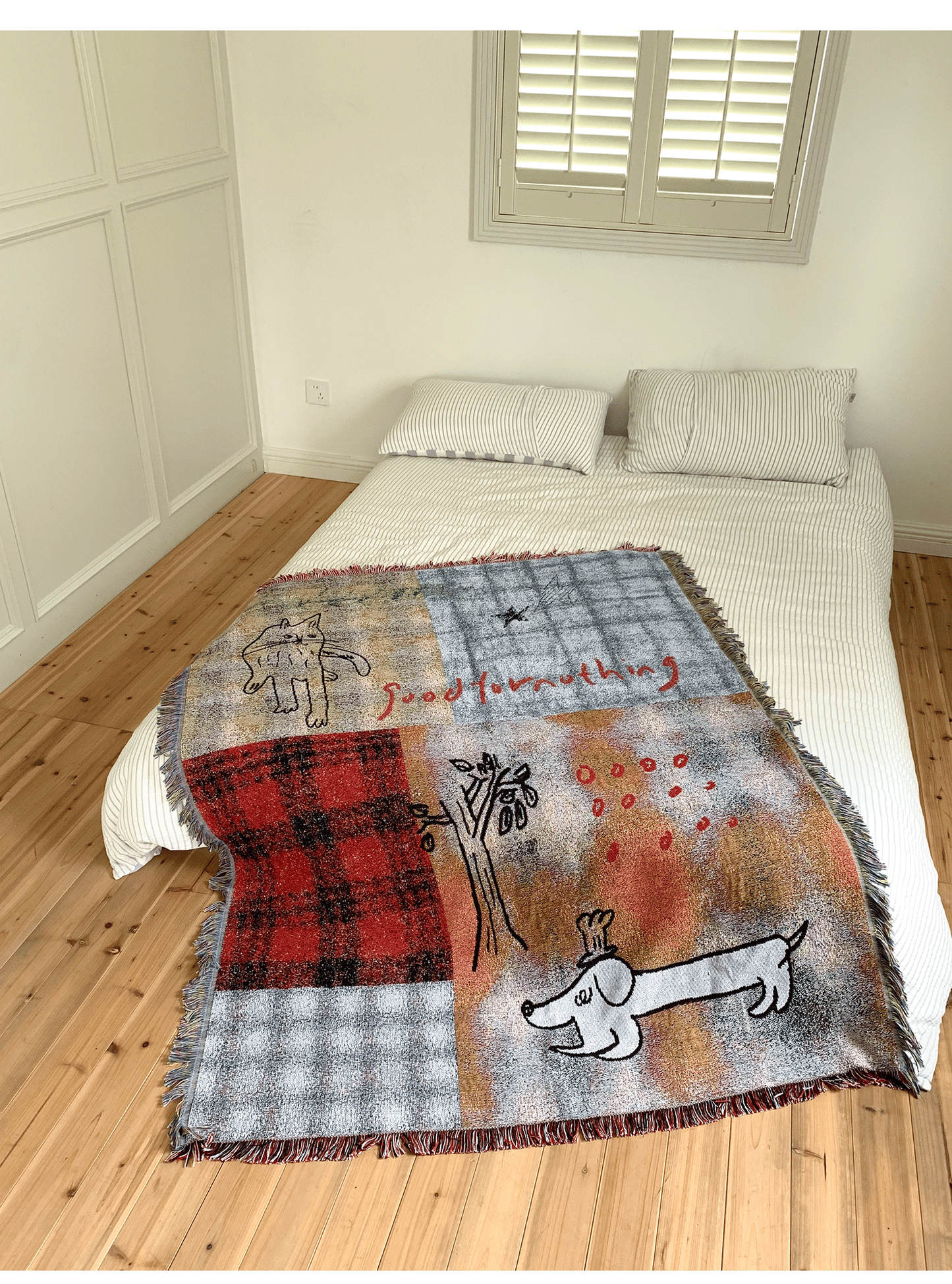 Goodfornothing is nothing like nothing in a vintage checked puppy art tapestry sofa blanket knitted blanket embellishment
