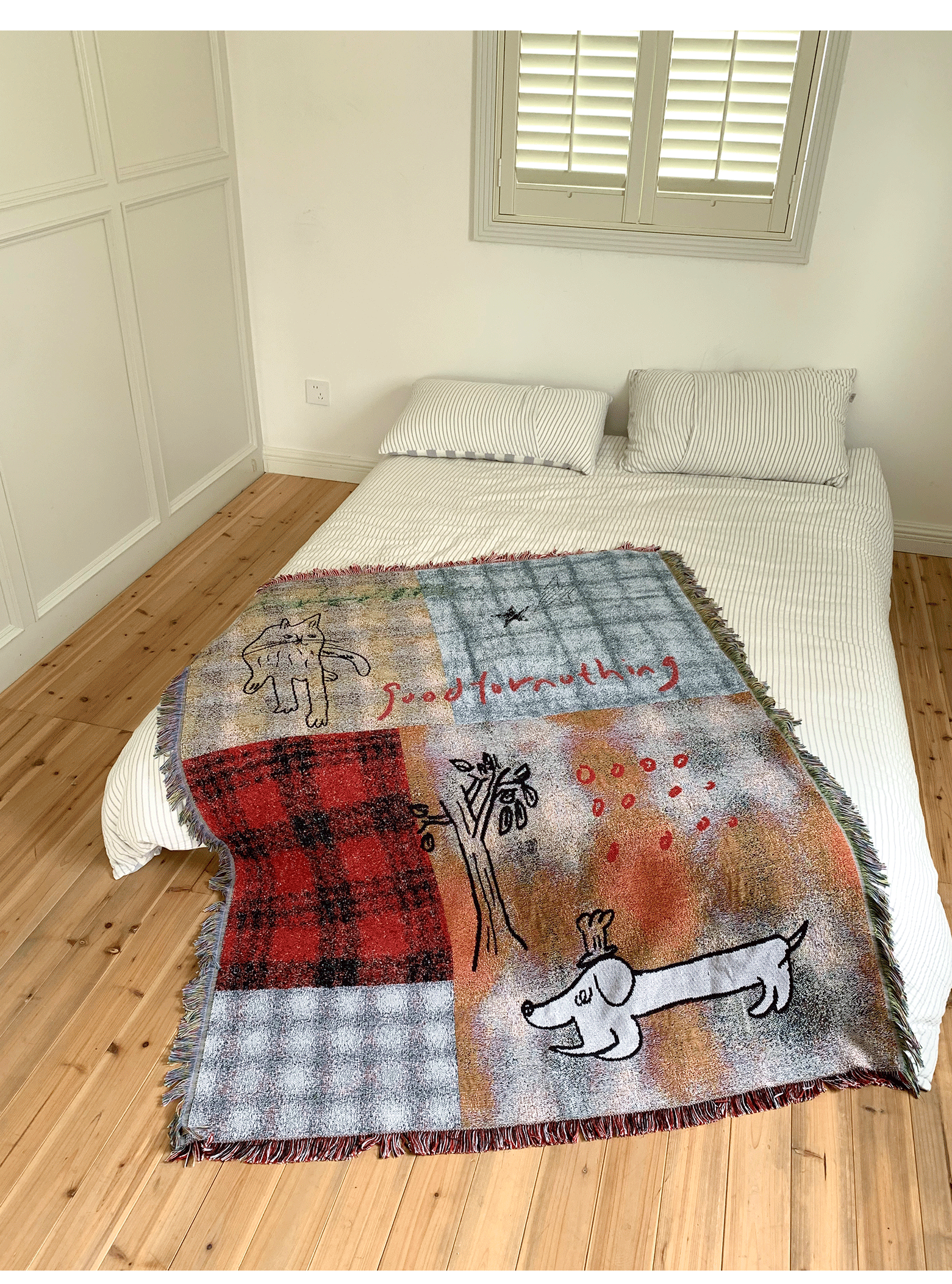 Goodfornothing is nothing like nothing in a vintage checked puppy art tapestry sofa blanket knitted blanket embellishment