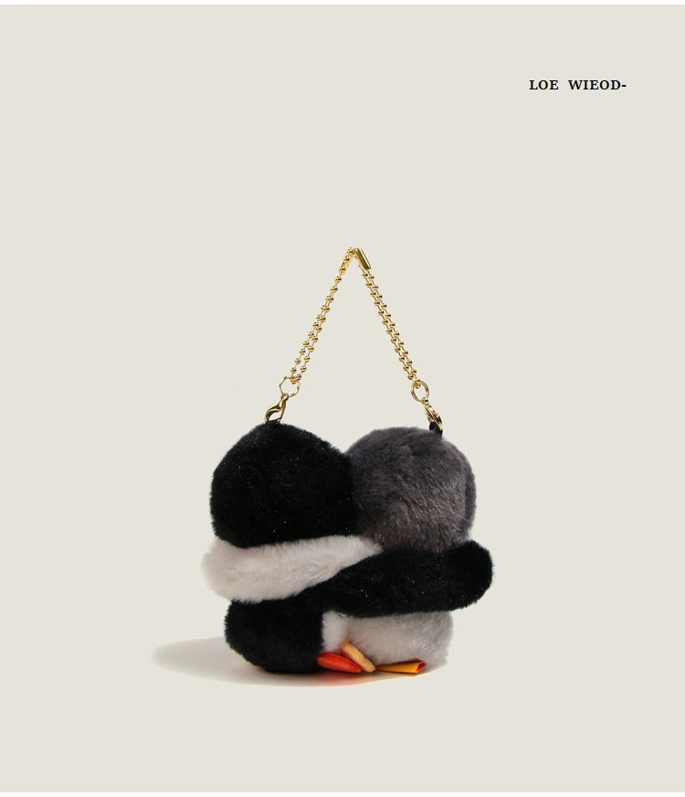 Animal Hugging Plush Keychain