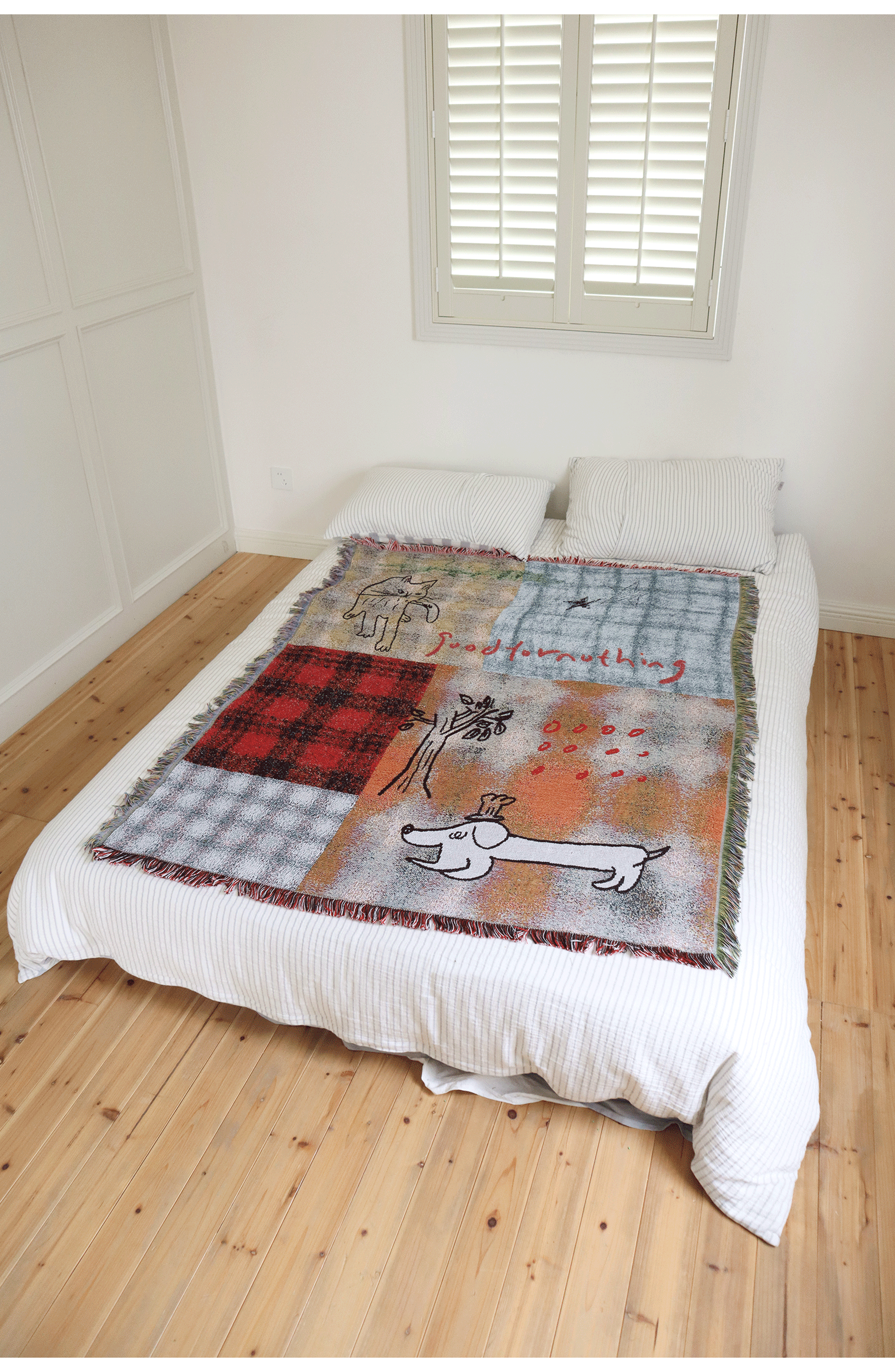 Goodfornothing is nothing like nothing in a vintage checked puppy art tapestry sofa blanket knitted blanket embellishment