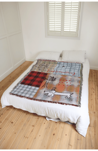 Goodfornothing is nothing like nothing in a vintage checked puppy art tapestry sofa blanket knitted blanket embellishment