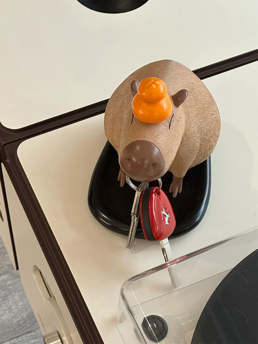 Ceramic animal tray held in hand, perfect for small accessory storage
