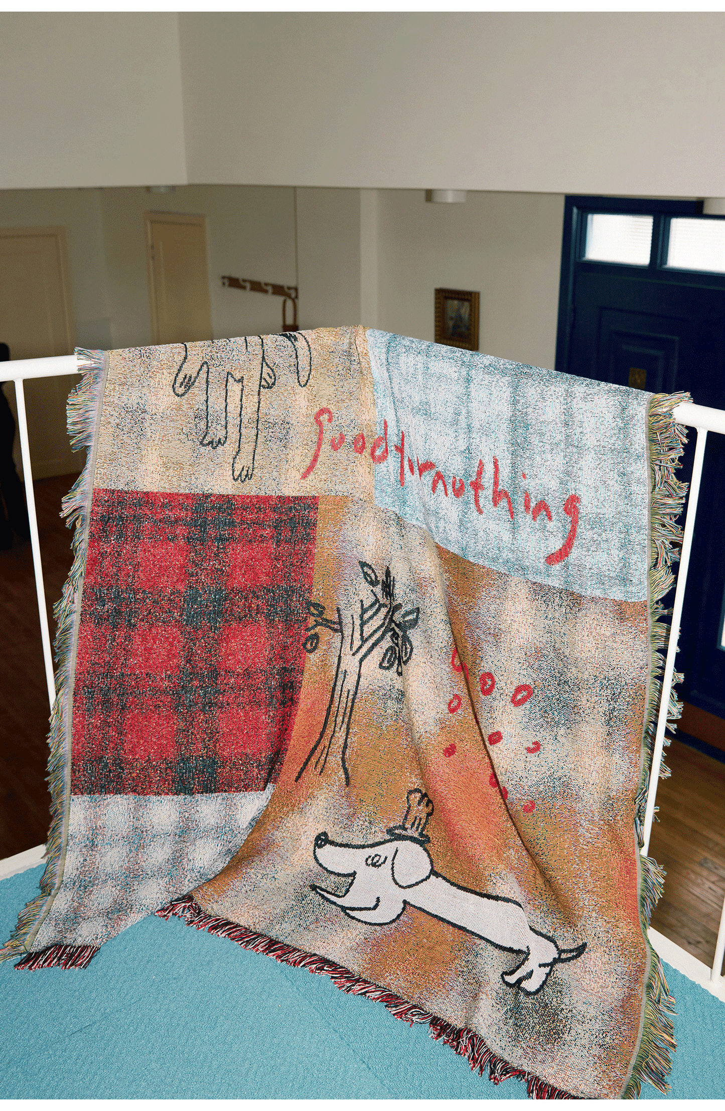 Goodfornothing is nothing like nothing in a vintage checked puppy art tapestry sofa blanket knitted blanket embellishment