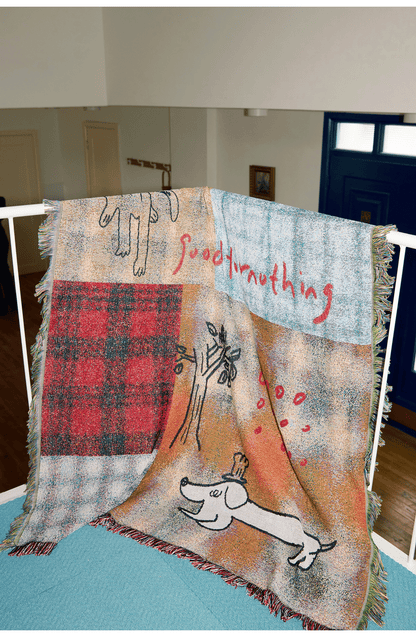 Goodfornothing is nothing like nothing in a vintage checked puppy art tapestry sofa blanket knitted blanket embellishment