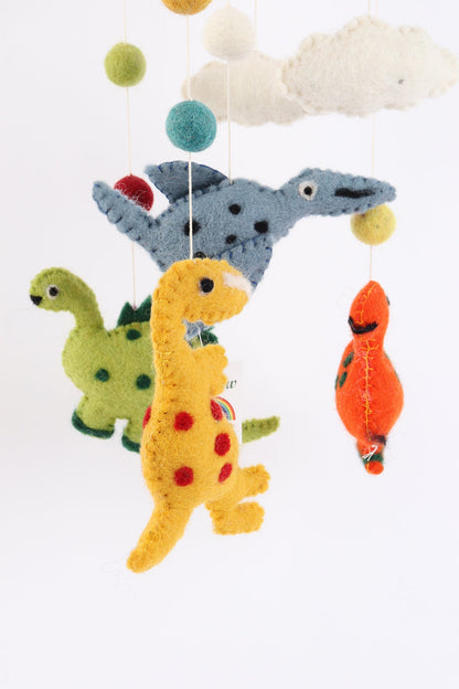 Handmade wool baby mobile featuring herbivorous dinosaurs and a pterosaur, eco-friendly nursery decoration from Nepal