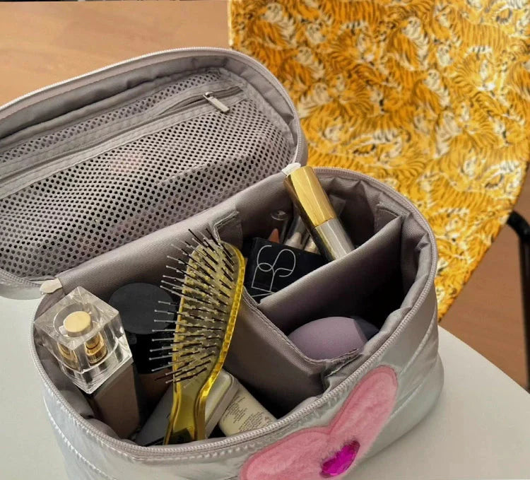 Silver Y2K makeup bag with pink heart and jewel