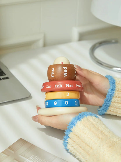 Wooden modular calendar styled on bookshelf with radio
