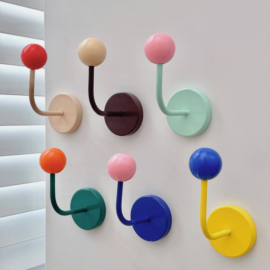 Set of colorful magnetic ball wall hooks for metal surfaces
