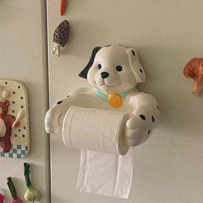 Dalmatian dog tissue holder mounted on fridge with vegetables

