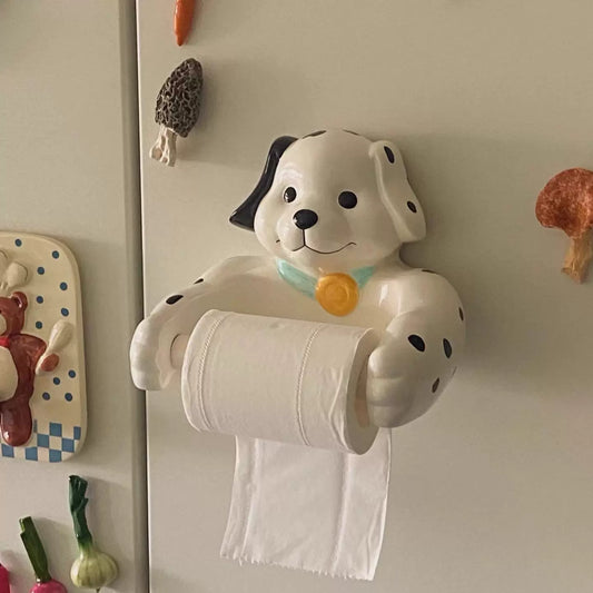 Dalmatian dog tissue holder mounted on fridge with vegetables
