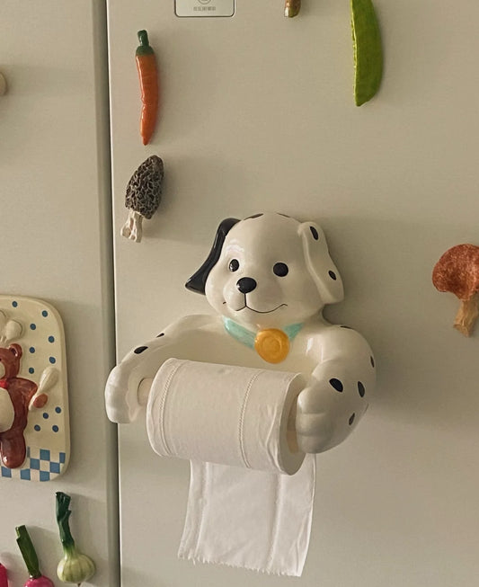 Front view of cute spotted dog toilet roll holder
