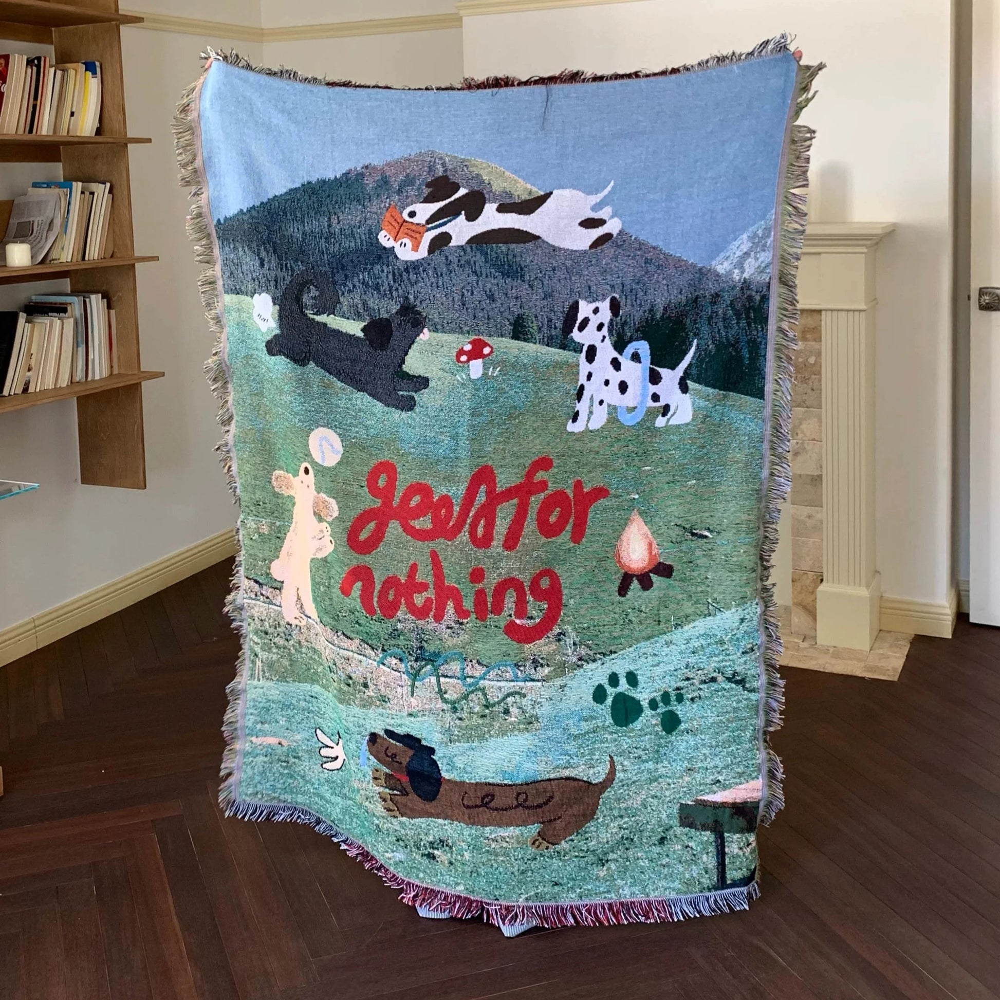 Colorful dog park tapestry blanket with multiple cartoon puppies

