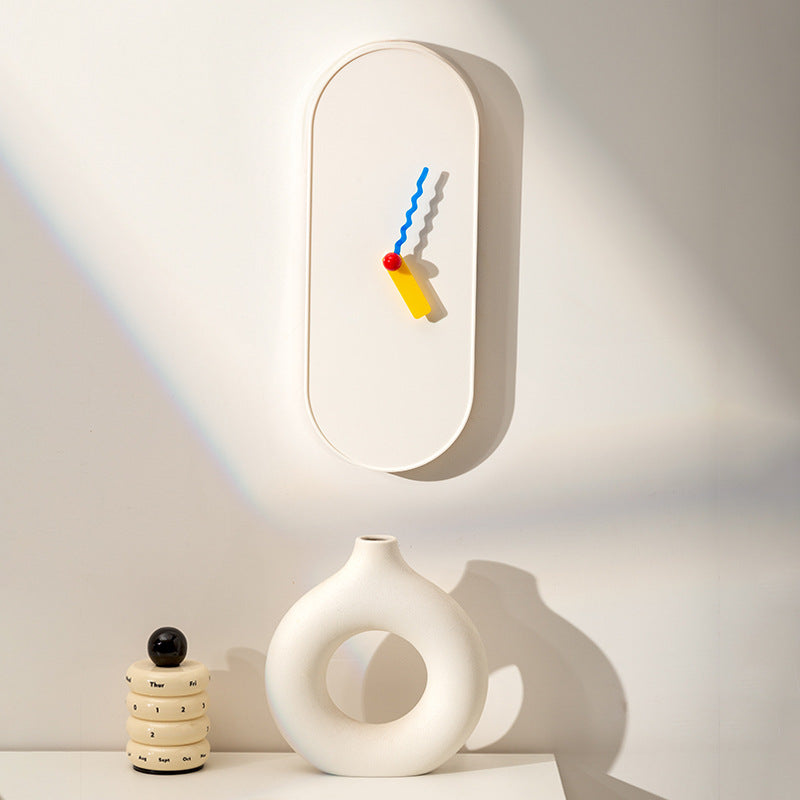  Minimalist Nordic-style wall clock in interior setting with soft shadows
