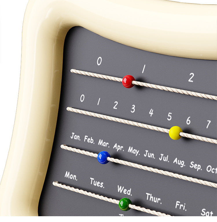 Close-up of colorful beads marking the date on rope calendar design