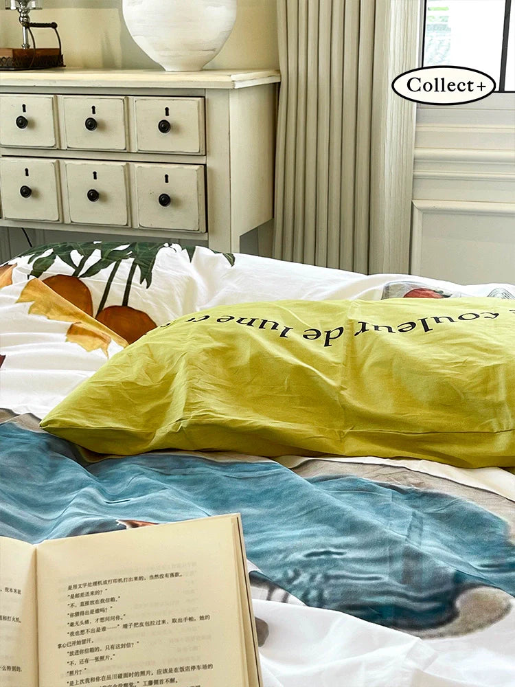 Cozy styled bed with summer cotton bedding and natural light