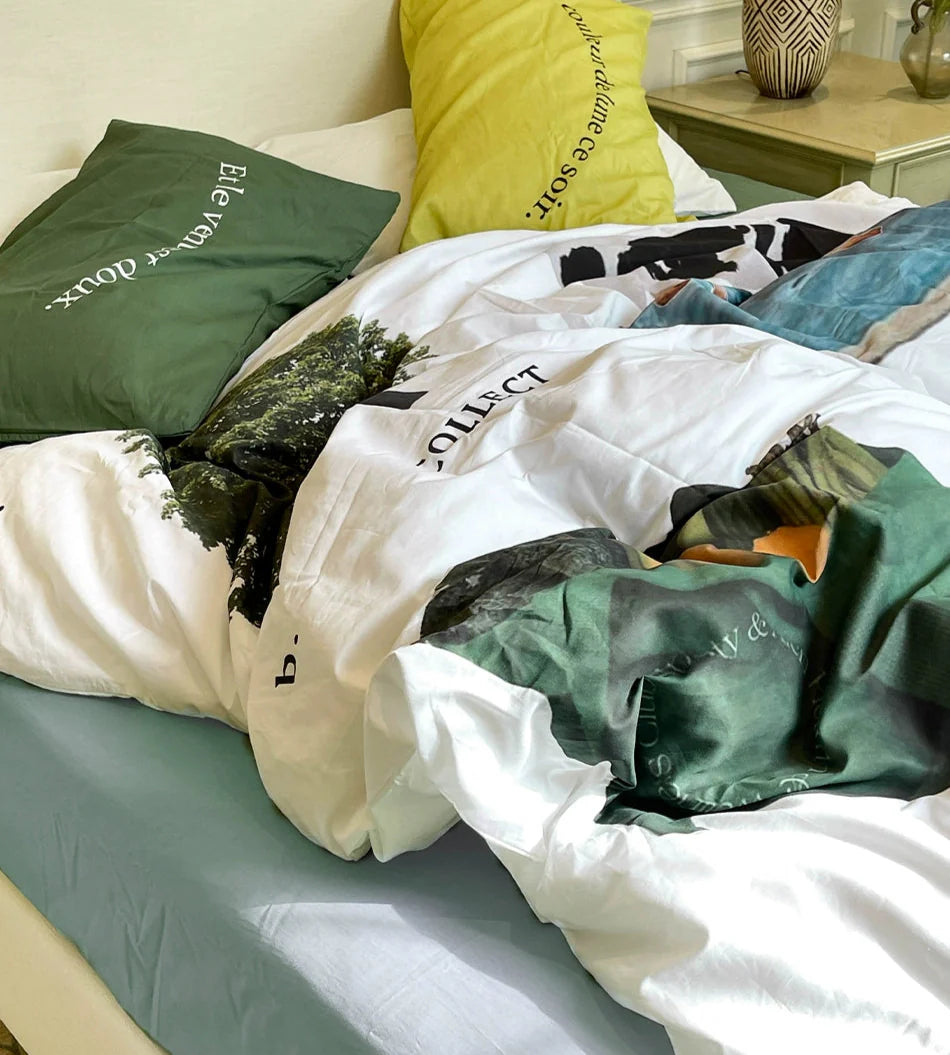 Cozy styled bed with summer cotton bedding and natural light